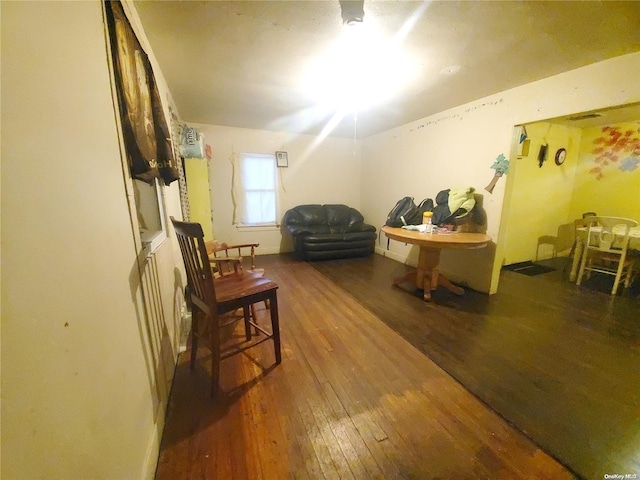 interior space with dark hardwood / wood-style flooring