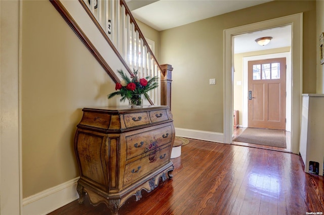 entryway with wood-type flooring