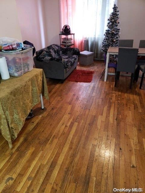 bedroom with hardwood / wood-style floors