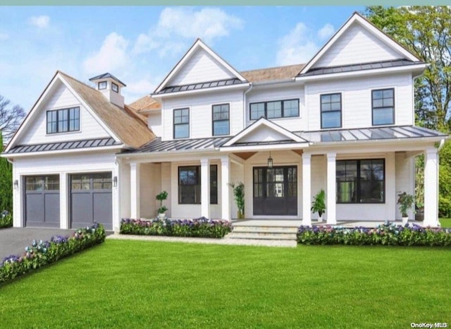 view of front facade featuring a front yard and a porch