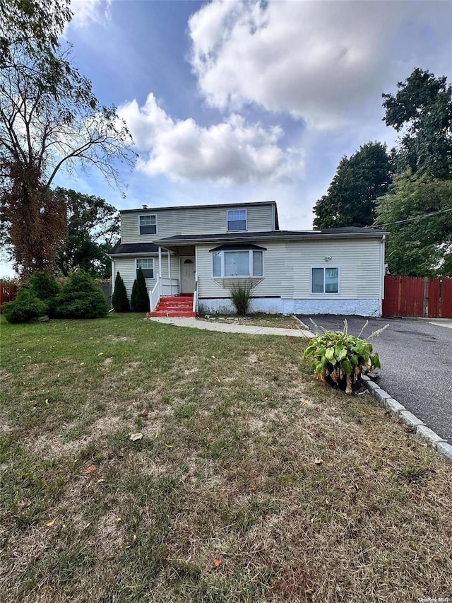 view of front of property with a front lawn