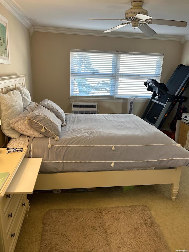 carpeted bedroom with ceiling fan, ornamental molding, and an AC wall unit