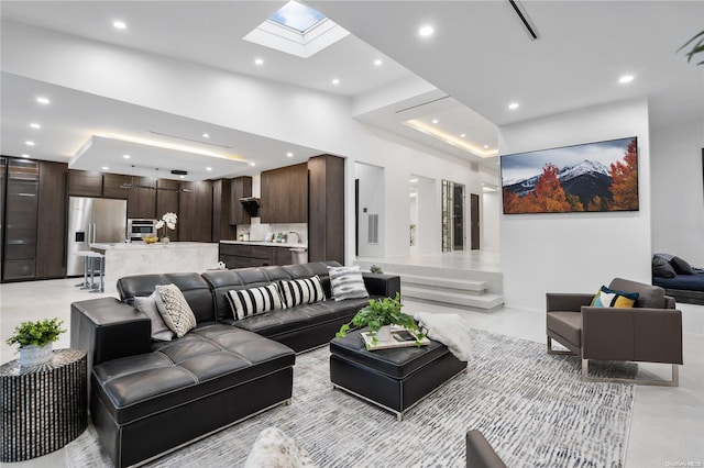 living room with a skylight