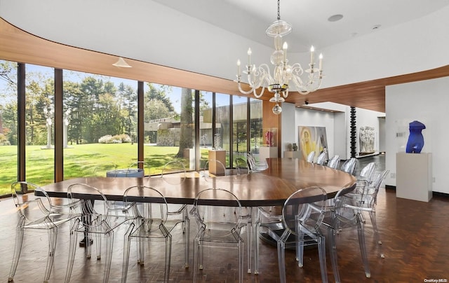 dining room with a wealth of natural light and a chandelier