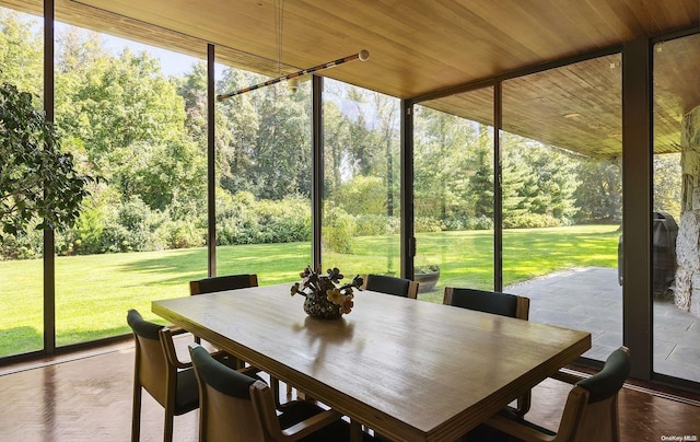 sunroom / solarium with wood ceiling