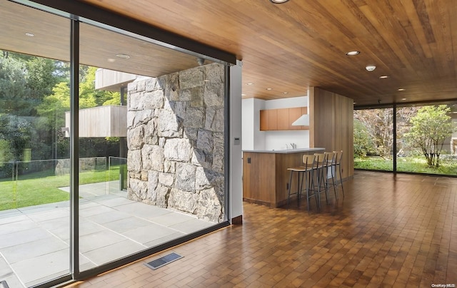 entryway featuring wood ceiling