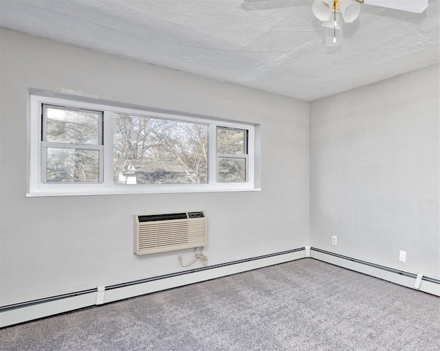 222 Smith St Unit 3C, Freeport, NY 11520 - carpeted empty room with a wall mounted air conditioner, ceiling fan, and a textured ceiling