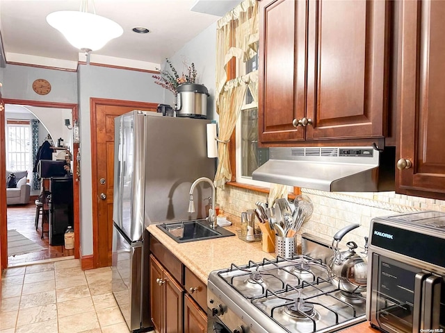 26-44 92nd St, Flushing, NY 11369 - kitchen with stainless steel range, sink, tasteful backsplash, range hood, and light wood-type flooring