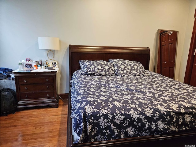 bedroom featuring hardwood / wood-style floors