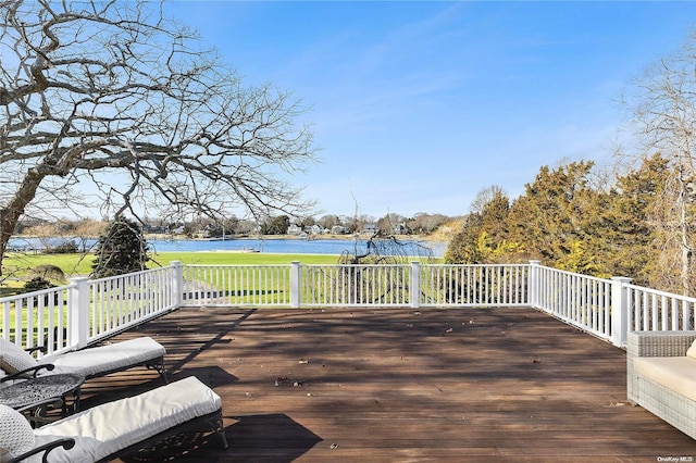 wooden terrace with a water view