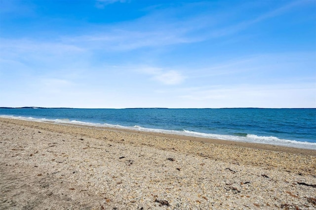 property view of water featuring a beach view