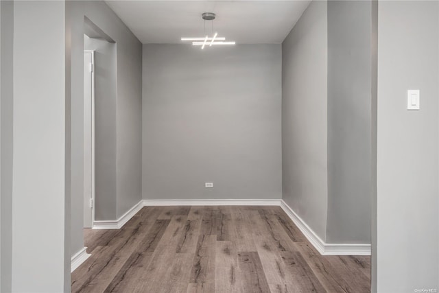 spare room featuring hardwood / wood-style flooring