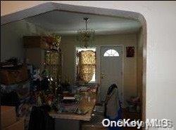 dining area featuring an inviting chandelier