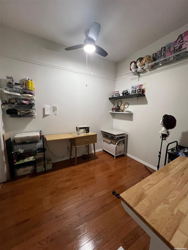 interior space featuring dark hardwood / wood-style floors and ceiling fan