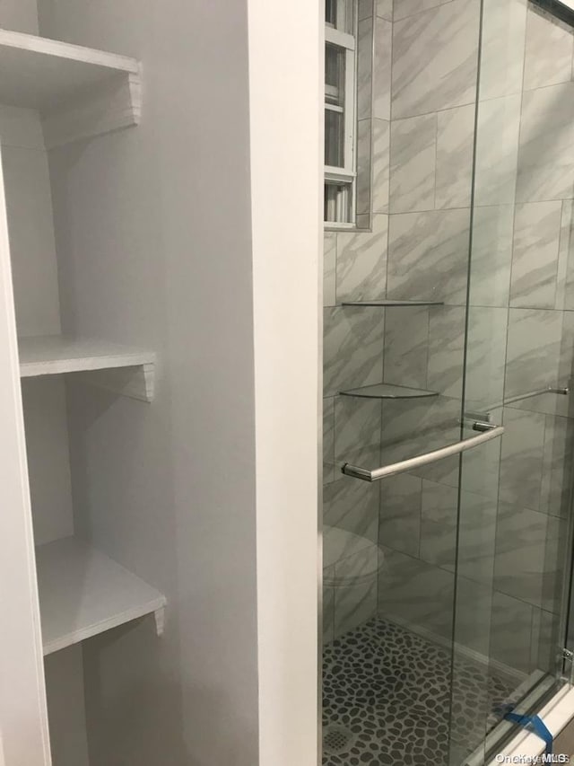 bathroom with walk in shower