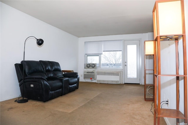 carpeted living room featuring radiator heating unit