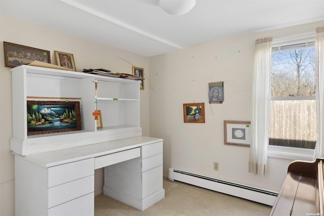 carpeted office with a baseboard radiator