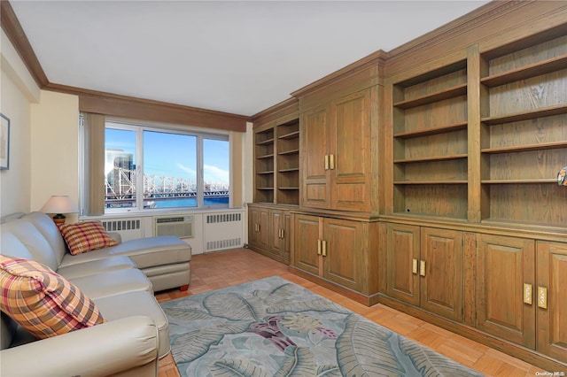 living room featuring radiator, light parquet floors, a water view, and ornamental molding