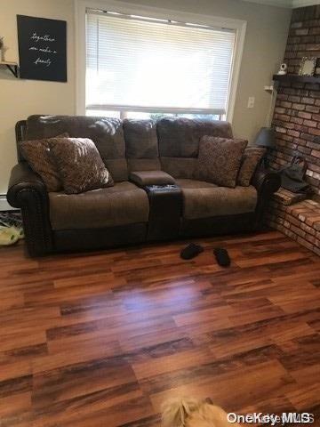 living room with wood-type flooring