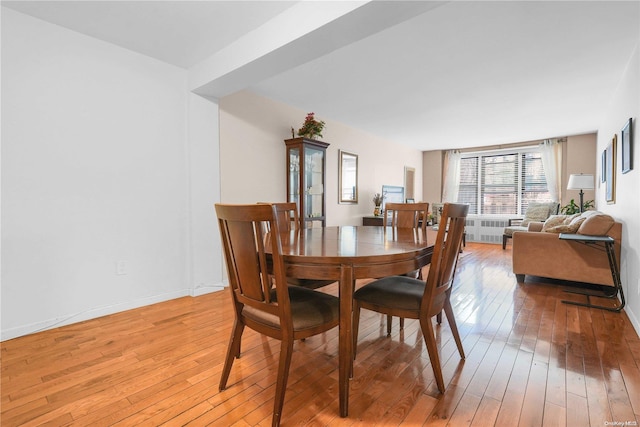 dining space featuring light hardwood / wood-style flooring