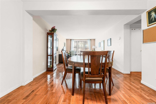 dining room featuring light hardwood / wood-style flooring