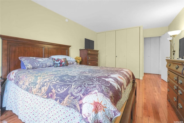 bedroom with hardwood / wood-style floors