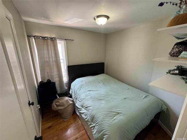 bedroom featuring hardwood / wood-style floors