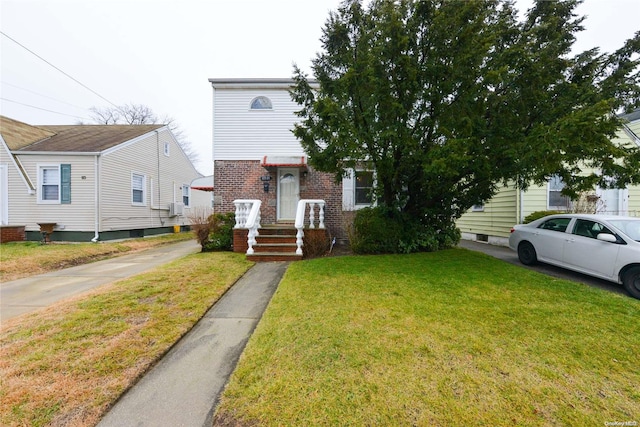 view of front of home with a front lawn