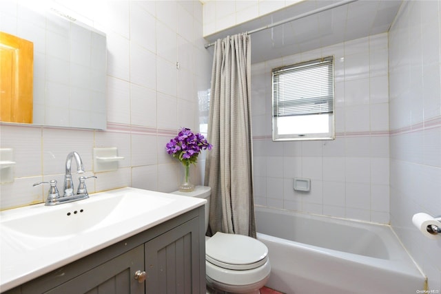 full bathroom with shower / tub combo, tasteful backsplash, vanity, tile walls, and toilet