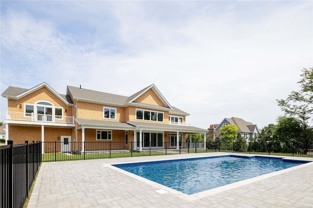 view of swimming pool with a patio