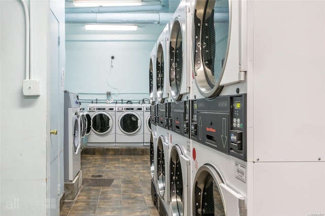 laundry room with washing machine and dryer and stacked washing maching and dryer