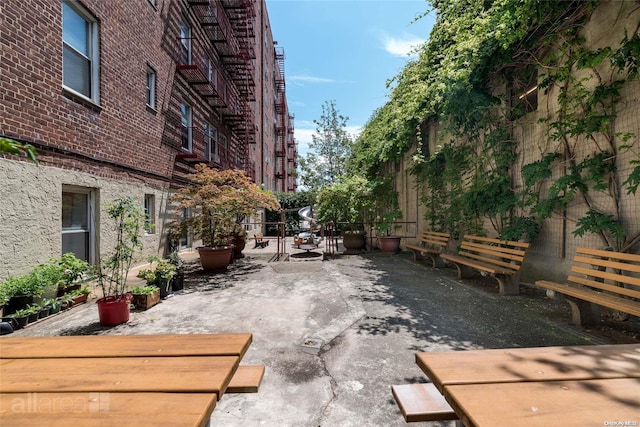 view of community with a patio area