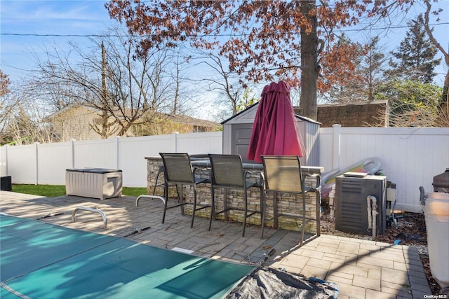 view of patio / terrace featuring exterior bar