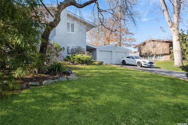 view of yard featuring a garage