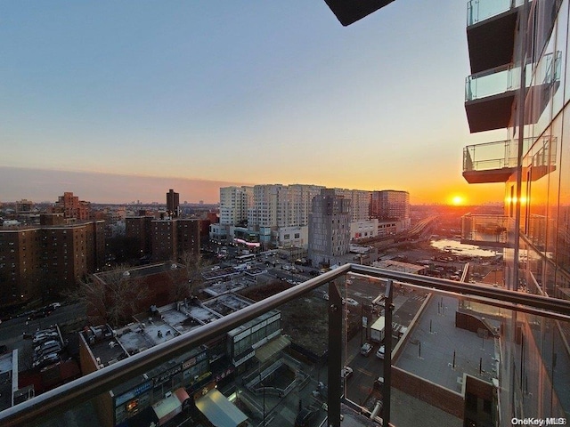 view of balcony at dusk