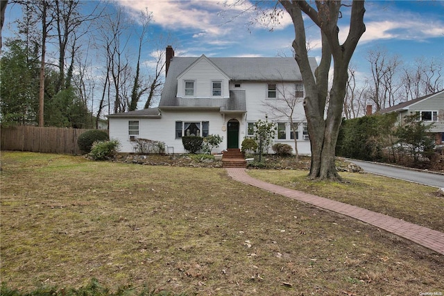 view of front of house with a yard