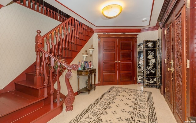 entrance foyer with crown molding