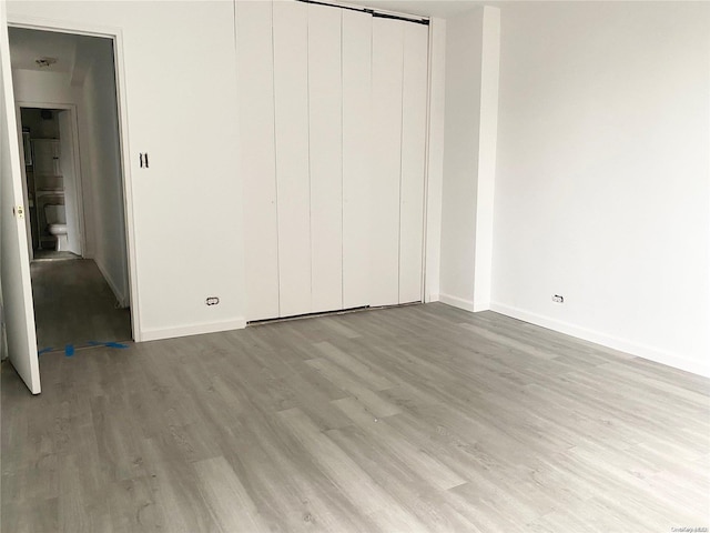 unfurnished bedroom featuring light hardwood / wood-style flooring