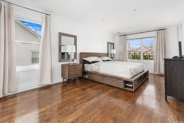 bedroom featuring dark hardwood / wood-style floors