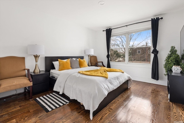 bedroom featuring dark hardwood / wood-style floors