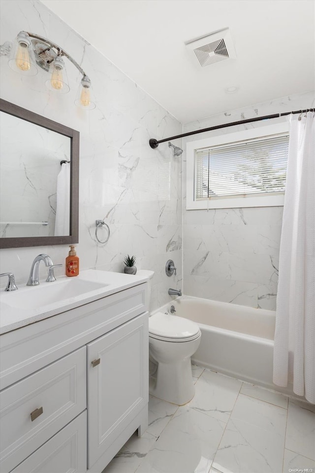 full bathroom with vanity, toilet, and shower / bath combo with shower curtain