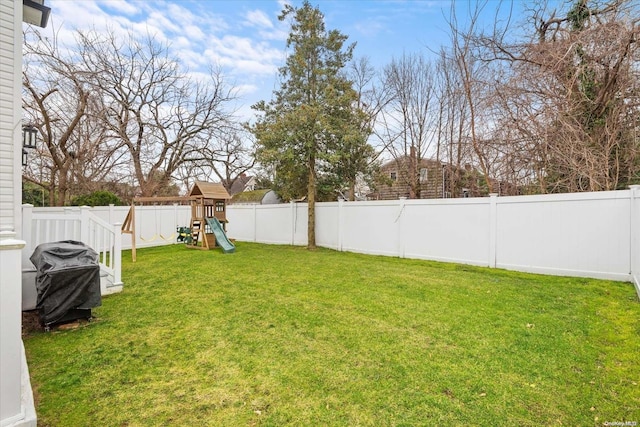 view of yard with a playground