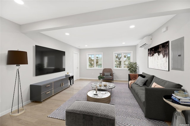 living room featuring light wood-type flooring, electric panel, and an AC wall unit