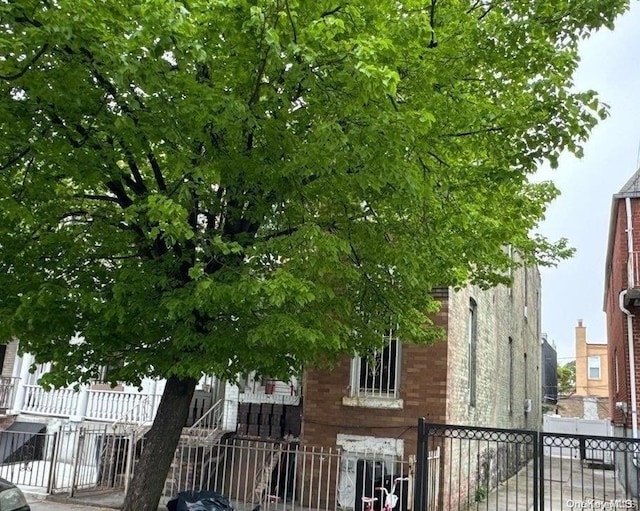 36 Hale Ave, Brooklyn, NY 11208 - exterior space featuring a fenced front yard and a gate