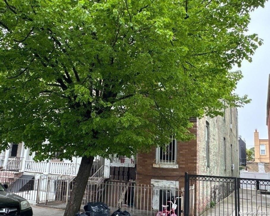 36 Hale Ave, Brooklyn, NY 11208 - view of building exterior featuring a fenced front yard