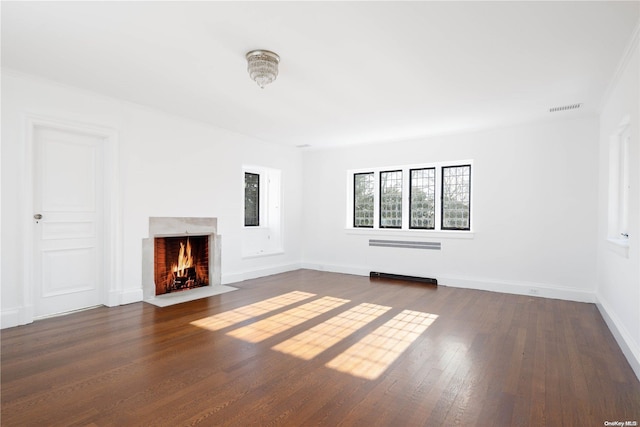 16 Tuthill Ln, Remsenburg, NY 11960 - unfurnished living room featuring a high end fireplace and dark wood finished floors
