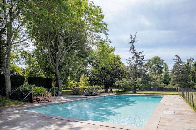 16 Tuthill Ln, Remsenburg, NY 11960 - view of pool featuring view of wooded area