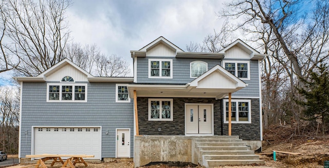 view of front of property with a garage