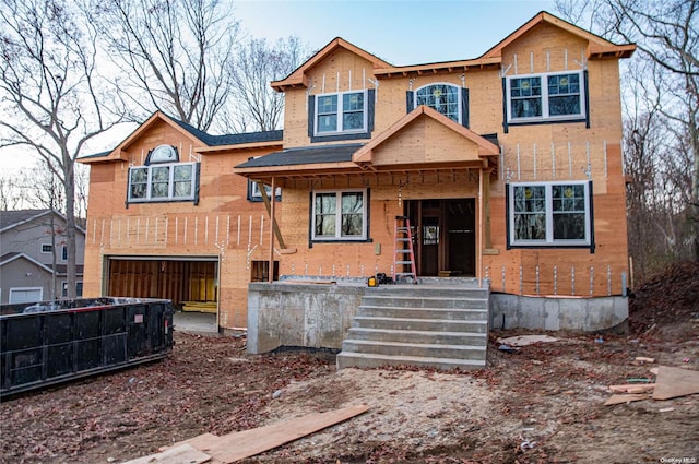 view of front of property featuring a garage