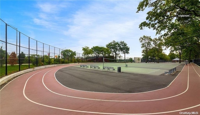 view of basketball court featuring tennis court